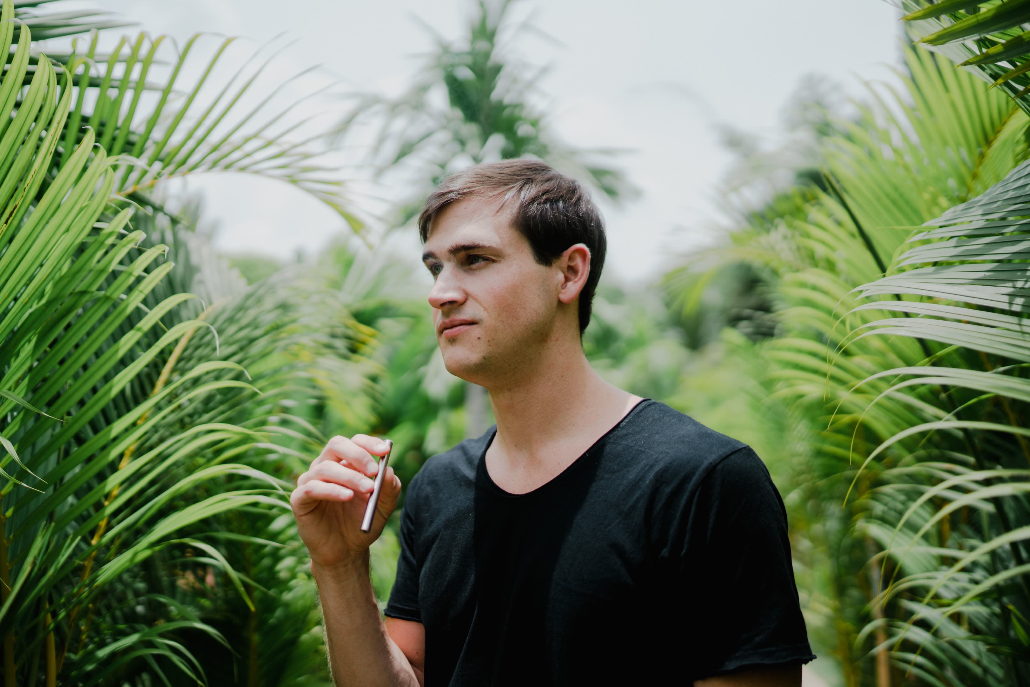 man holding MONQ aromatherapy diffuser
